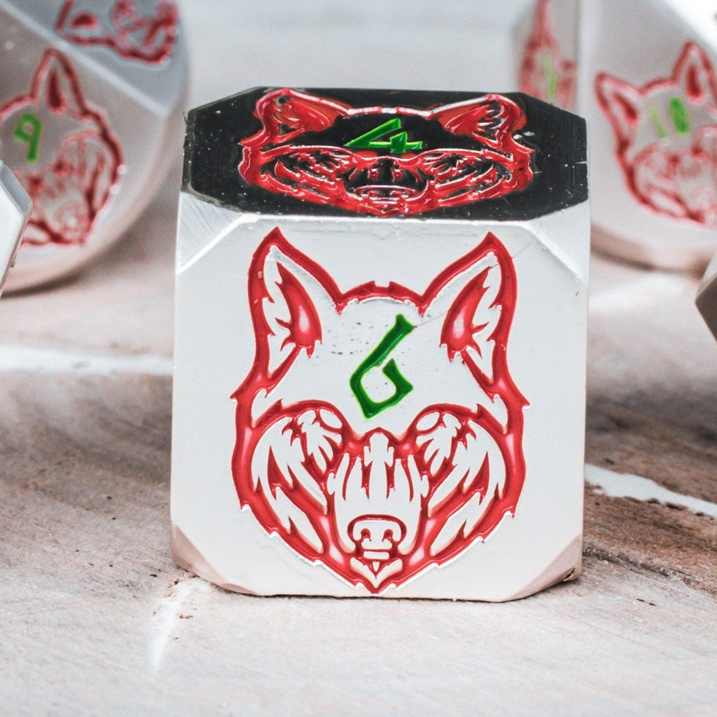 Wolves' Den Red, Green, and Silver Metal Dice Set